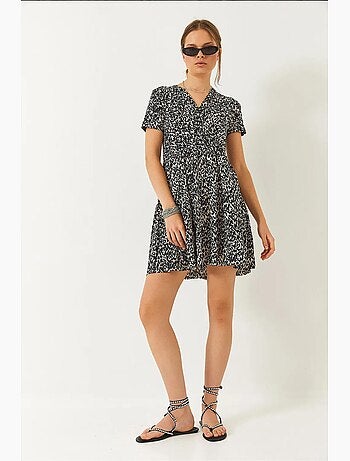 Mini-robe à manches courtes et col cache-cœur à motifs lucci