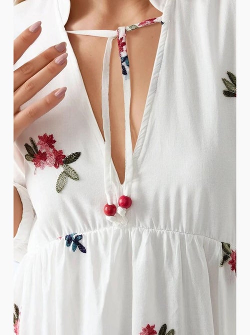 Mini-robe à motifs et col en v hiccup - Kiabi Mini-robe à motifs et col en v hiccup - Kiabi