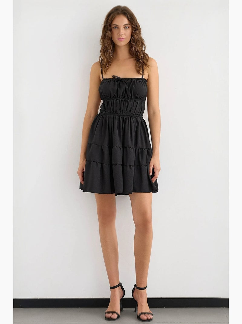 Mini-robe en coton avec détails noués hiccup Noir - Kiabi
