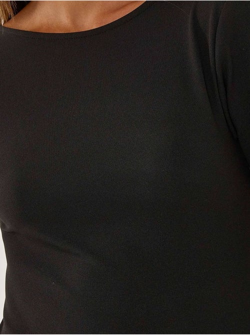 Mini-robe moulante avec décolleté dans le dos - Kiabi Mini-robe moulante avec décolleté dans le dos - Kiabi