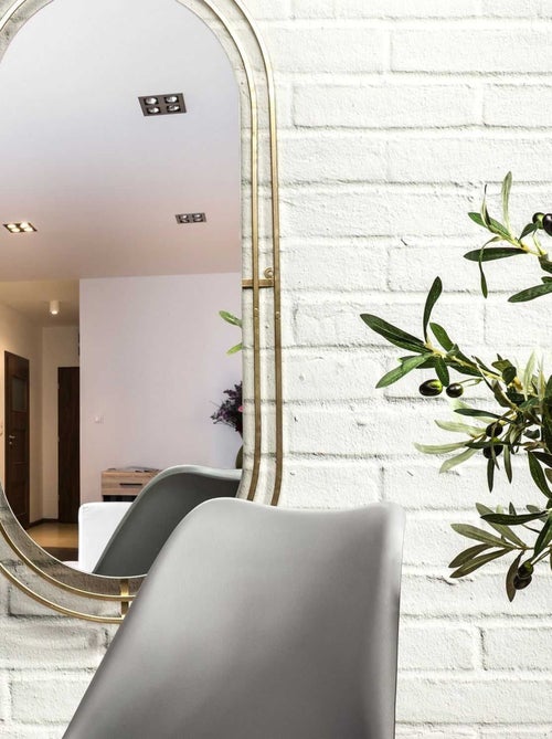 Miroir ovale design en métal et verre - Kiabi