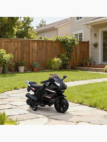 Moto électrique enfant de sport avec effets stabilisateurs amovibles