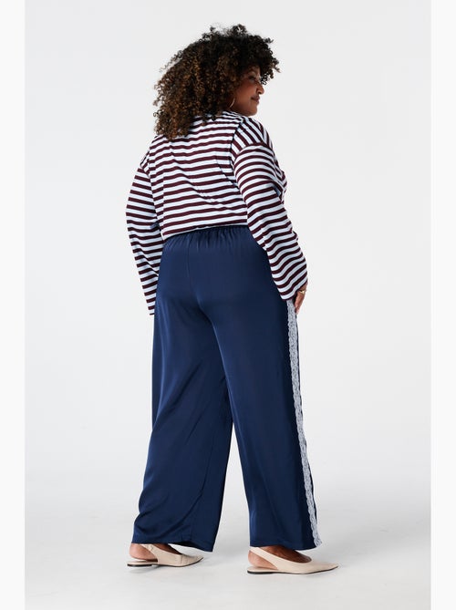 Ms mode pantalon avec détails en dentelle sur les côtés - Kiabi Ms mode pantalon avec détails en dentelle sur les côtés - Kiabi