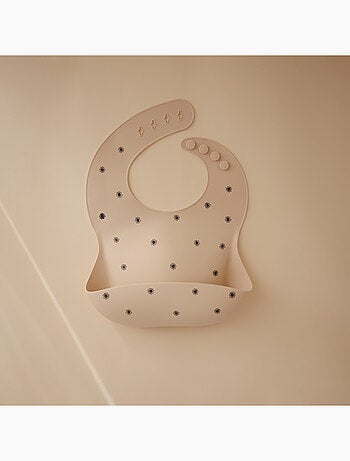 Mushie - Bavoir à poche en silicone