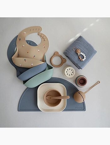 Mushie - Bavoir à poche en silicone