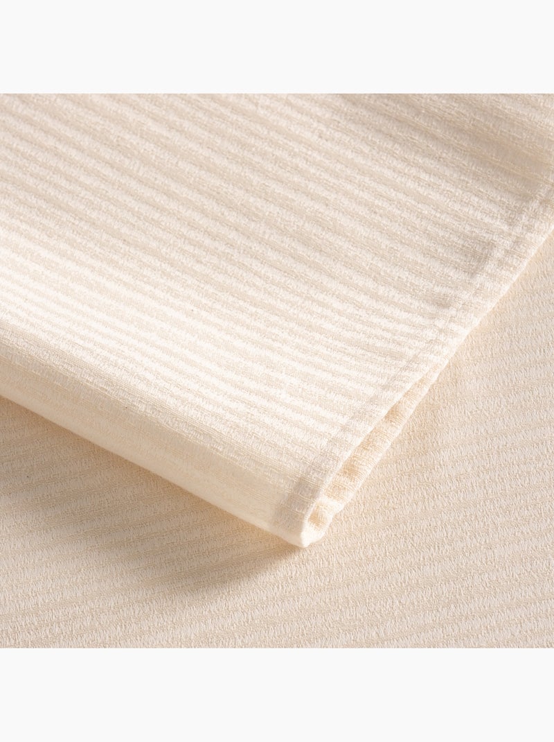Nappe antitache avec tissu texturé à fines rayures - Gamusi. Crème - Kiabi