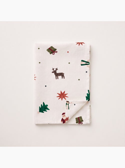Nappe de noël imperméable avec imprimé père noël, rennes, cadeaux et sapins - gamusi. - Kiabi Nappe de noël imperméable avec imprimé père noël, rennes, cadeaux et sapins - gamusi. - Kiabi