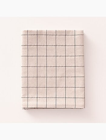 Nappe ronde avec motif à carreaux en relief - Gamusi.