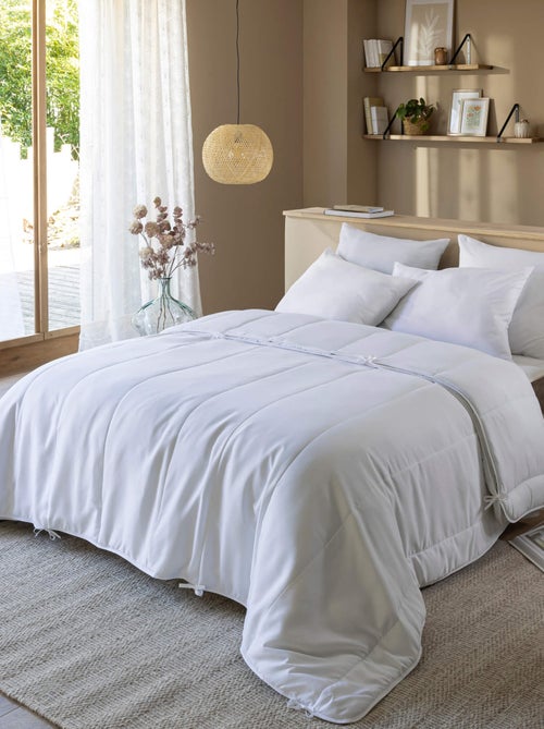 Pack couette 4 saisons et oreiller anti-acariens et anti-bactériens - Terre de Nuit - Kiabi Pack couette 4 saisons et oreiller anti-acariens et anti-bactériens - Terre de Nuit - Kiabi