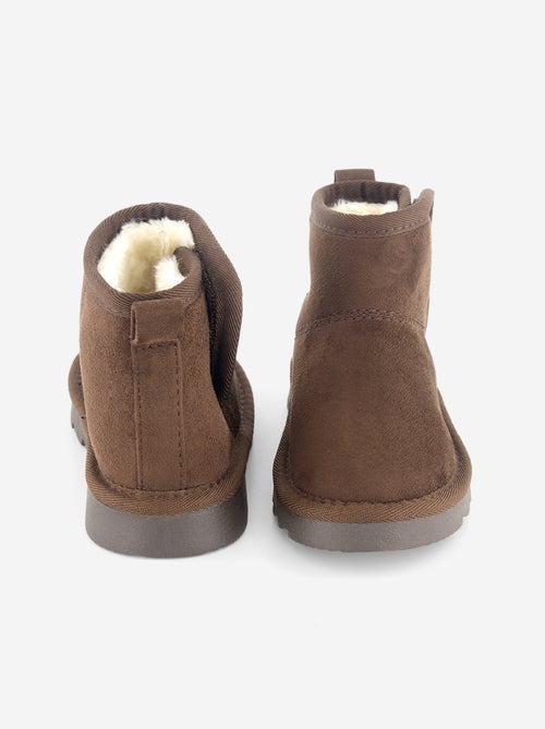 Paire de boots fourrées en suédine - Kiabi Paire de boots fourrées en suédine - Kiabi