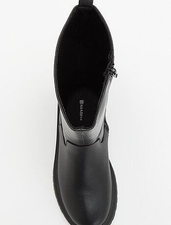 Paire de bottes montantes en simili