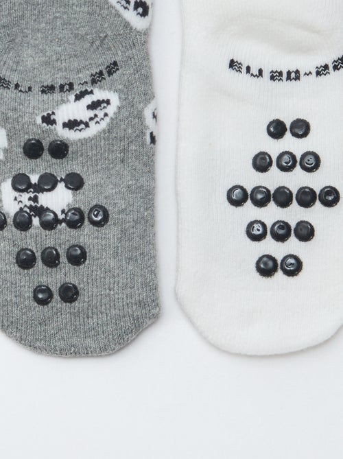 Paire de chaussettes fantaisie anti-dérapantes - Kiabi Paire de chaussettes fantaisie anti-dérapantes - Kiabi