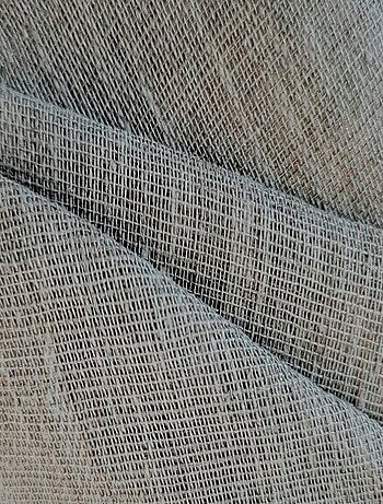 Paire de voilages étamine unie, vitrage finition œillets métal.