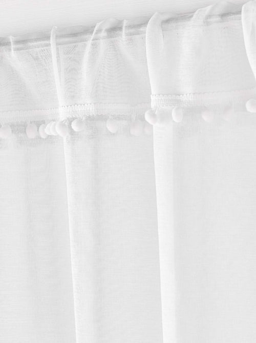 Paire de voilages passe-tringle en voile sablé avec finitions pompons - Kiabi