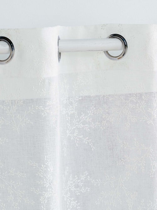 Paire de voilages passe-tringle en voile tissé motif feuillage - Kiabi Paire de voilages passe-tringle en voile tissé motif feuillage - Kiabi