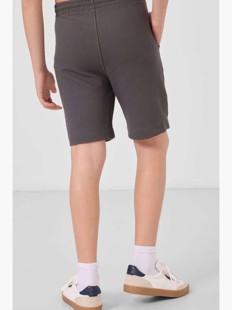 Pantacourt à enfiler en mélange de coton tommy Gris Noir - Kiabi