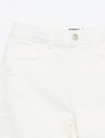 Pantacourt en jean finitions à cru