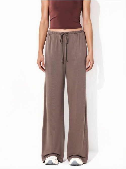 Pantalon à jambe large avec cordon de serrage busem - Kiabi Pantalon à jambe large avec cordon de serrage busem - Kiabi