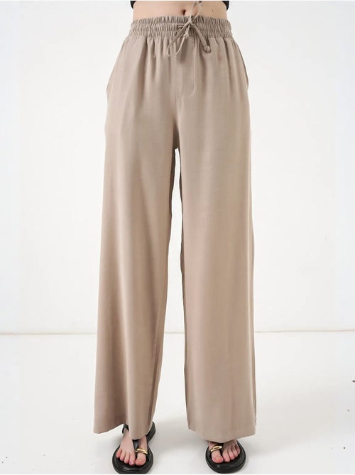 Pantalon à jambe large taille haute avec poche bdart - Kiabi Pantalon à jambe large taille haute avec poche bdart - Kiabi