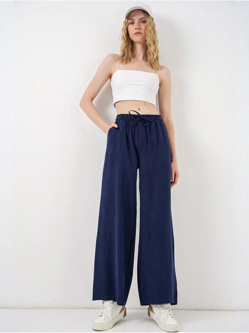 Pantalon à jambe large taille haute avec poche bdart - Kiabi Pantalon à jambe large taille haute avec poche bdart - Kiabi