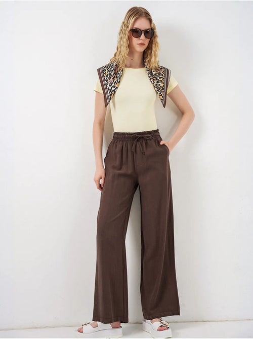 Pantalon à jambe large taille haute avec poche bdart - Kiabi Pantalon à jambe large taille haute avec poche bdart - Kiabi