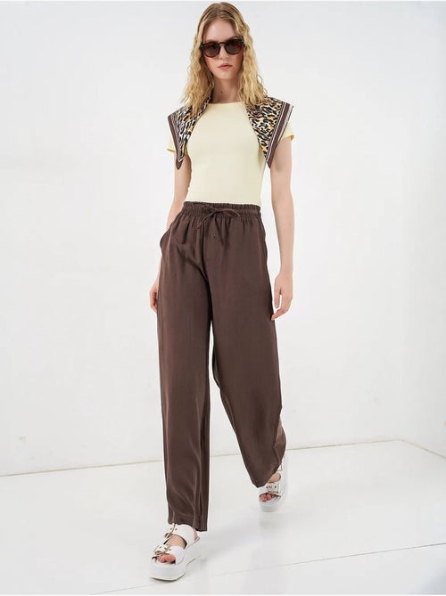 Pantalon à jambe large taille haute avec poche bdart - Kiabi Pantalon à jambe large taille haute avec poche bdart - Kiabi