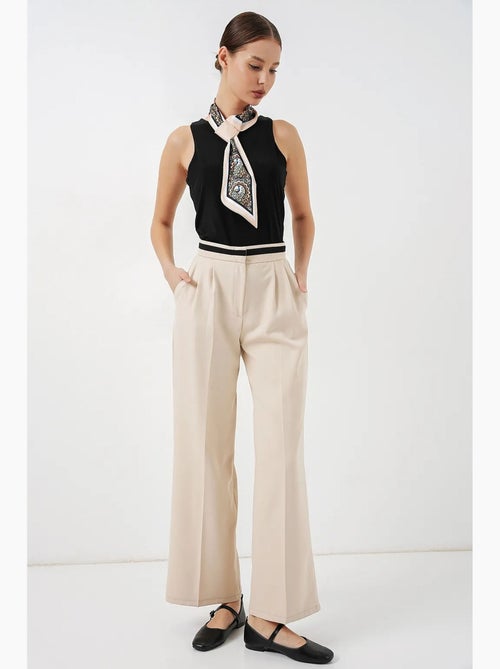Pantalon à jambe large taille haute avec poches bdart - Kiabi Pantalon à jambe large taille haute avec poches bdart - Kiabi