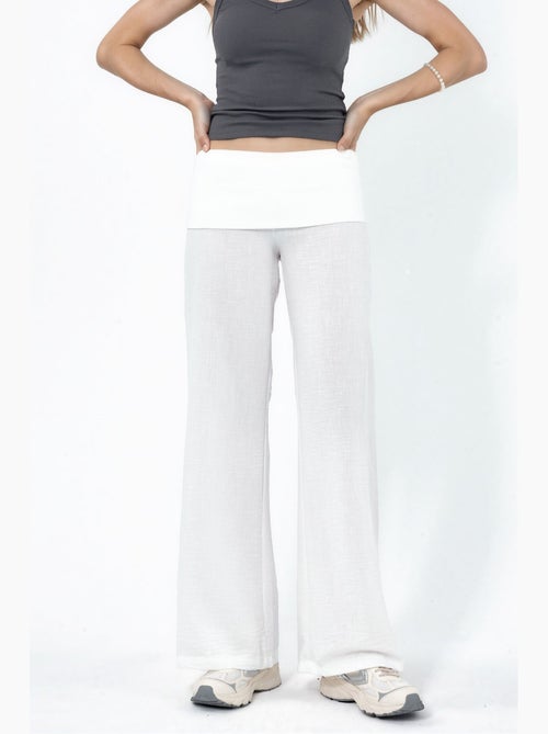 Pantalon à jambe large taille haute busem - Kiabi Pantalon à jambe large taille haute busem - Kiabi
