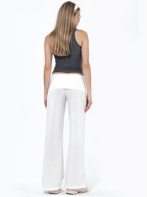 Pantalon à jambe large taille haute busem - Kiabi Pantalon à jambe large taille haute busem - Kiabi