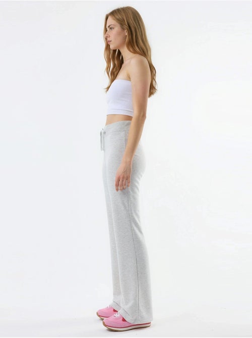 Pantalon à jambes évasées avec taille élastique busem - Kiabi Pantalon à jambes évasées avec taille élastique busem - Kiabi