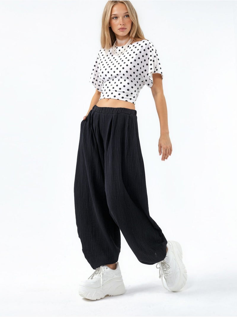 Pantalon à jambes larges avec taille élastique busem Noir - Kiabi