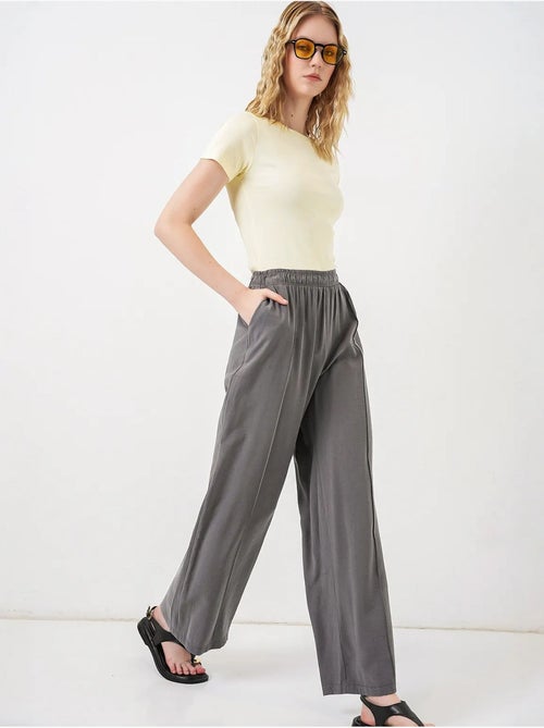 Pantalon à jambes larges et taille élastique bdart - Kiabi Pantalon à jambes larges et taille élastique bdart - Kiabi