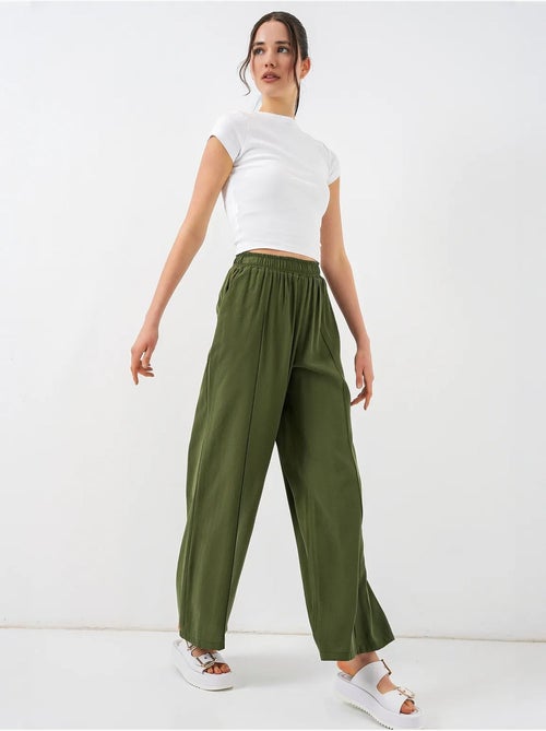 Pantalon à jambes larges et taille élastique bdart - Kiabi Pantalon à jambes larges et taille élastique bdart - Kiabi