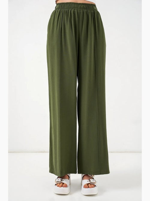 Pantalon à jambes larges et taille élastique bdart - Kiabi Pantalon à jambes larges et taille élastique bdart - Kiabi