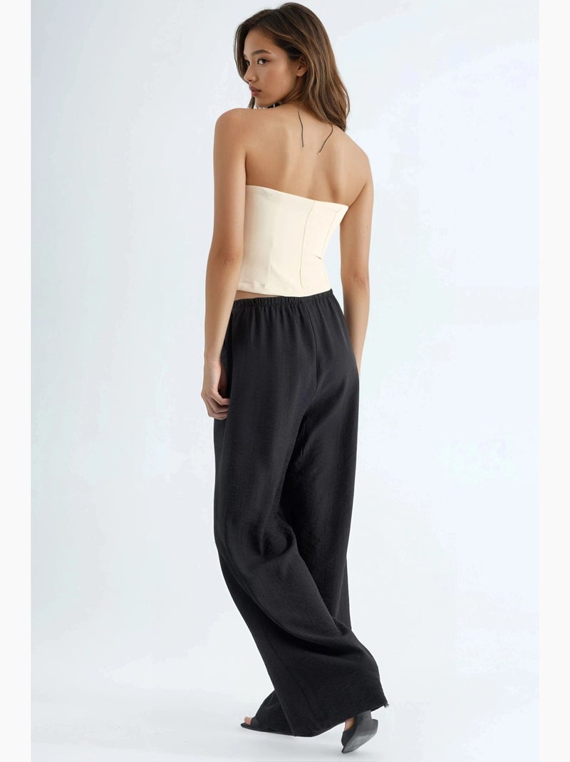 Pantalon à jambes larges et taille élastiquée avec cordon de serrage et poches busem Noir - Kiabi