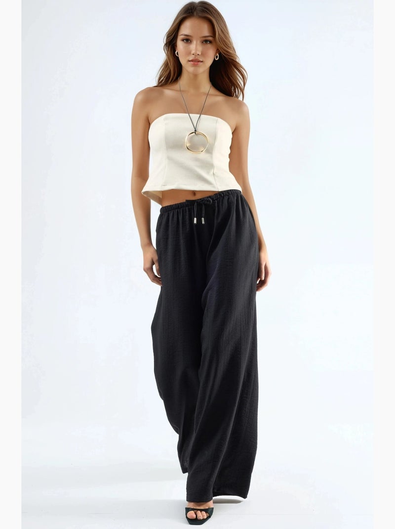 Pantalon à jambes larges et taille élastiquée avec cordon de serrage et poches busem Noir - Kiabi