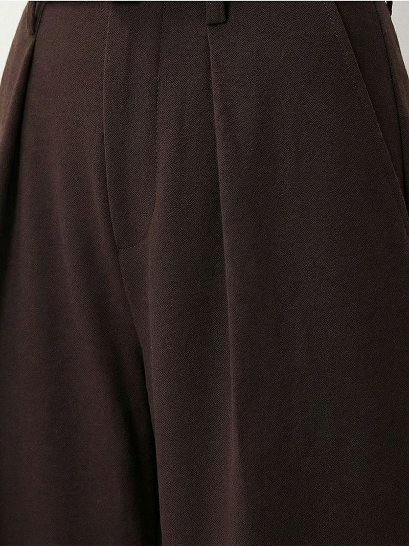 Pantalon à jambes larges plissé et ceinturé istanbul Marron chocolat - Kiabi