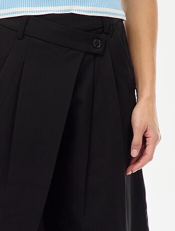 Pantalon à pinces asymétrique