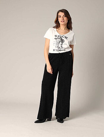 Pantalon ample et fluide en maille brillante
'Deeluxe'
