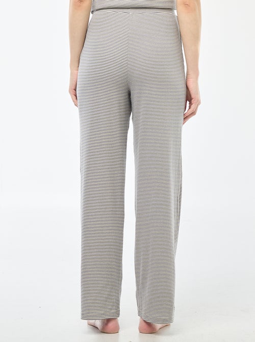 Pantalon côtelé de nuit all-over 'fleur' - Kiabi