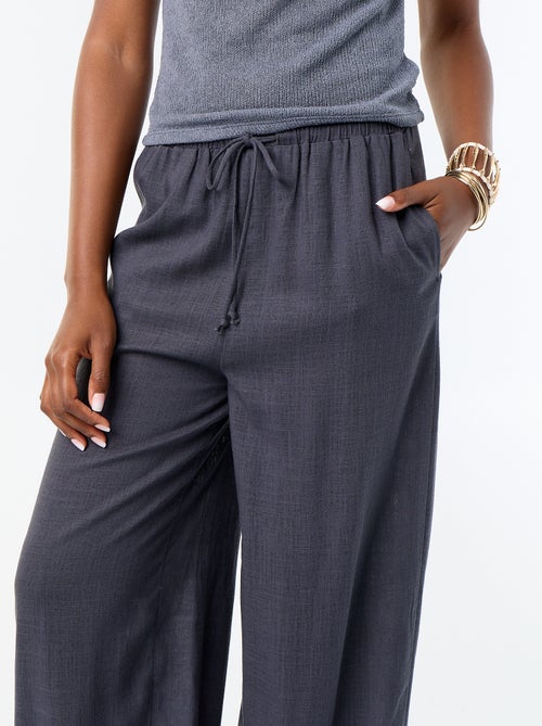 Pantalon coupe balloon uni avec 2 poches - Kiabi
