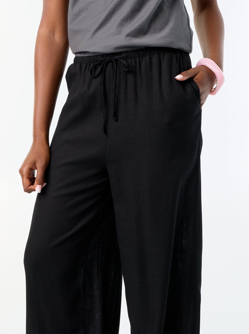 Pantalon coupe balloon uni avec 2 poches Noir - Kiabi