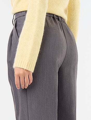 Pantalon coupe carotte taille haute