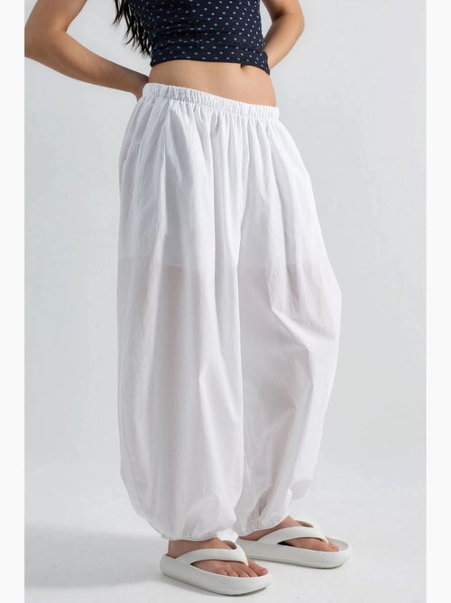Pantalon crêpe à jambes larges busem - Kiabi Pantalon crêpe à jambes larges busem - Kiabi