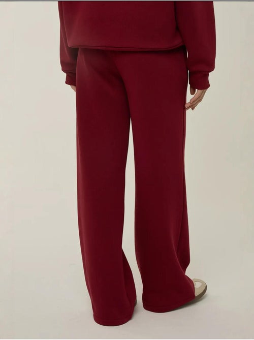Pantalon de jogging à jambes larges avec cordon de serrage à la taille hiccup - Kiabi Pantalon de jogging à jambes larges avec cordon de serrage à la taille hiccup - Kiabi