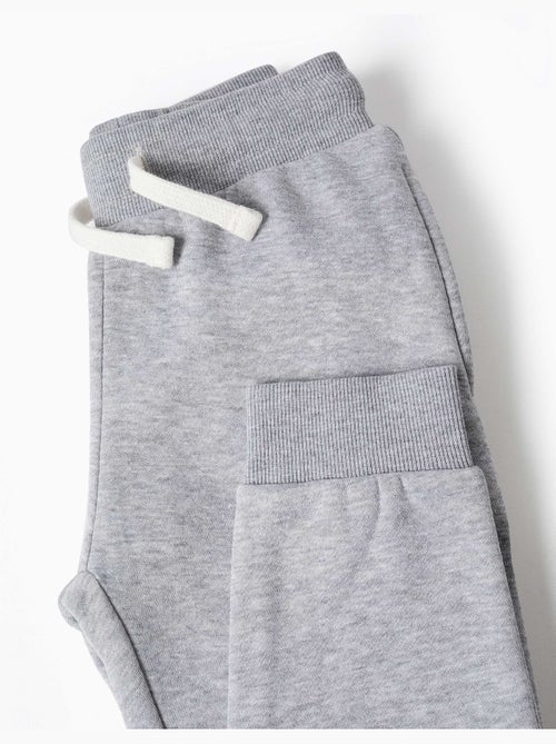 Pantalon de jogging ajusté en molleton avec cordon de serrage - Kiabi Pantalon de jogging ajusté en molleton avec cordon de serrage - Kiabi