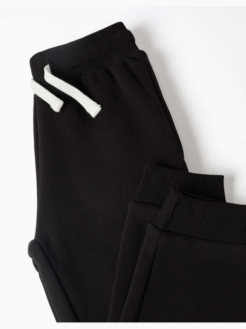 Pantalon de jogging ajusté en molleton avec cordon de serrage - Kiabi Pantalon de jogging ajusté en molleton avec cordon de serrage - Kiabi