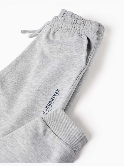Pantalon de jogging ajusté en molleton avec poches et imprimé zy - Kiabi