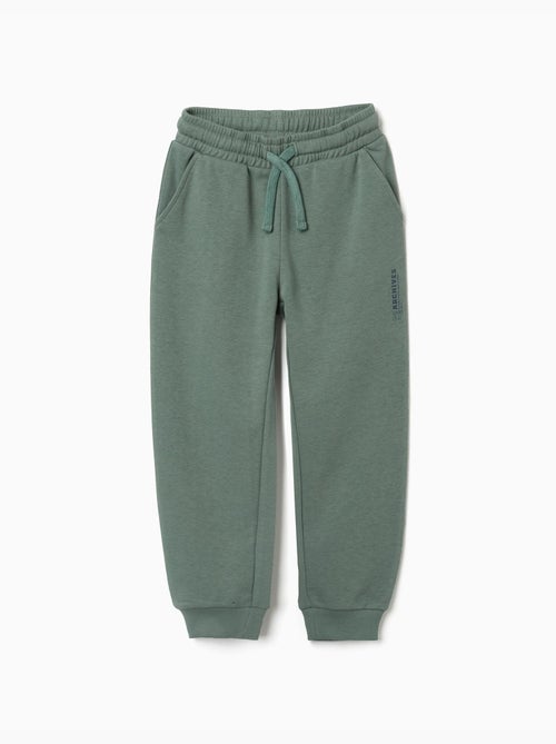 Pantalon de jogging ajusté en molleton avec poches et imprimé zy - Kiabi Pantalon de jogging ajusté en molleton avec poches et imprimé zy - Kiabi