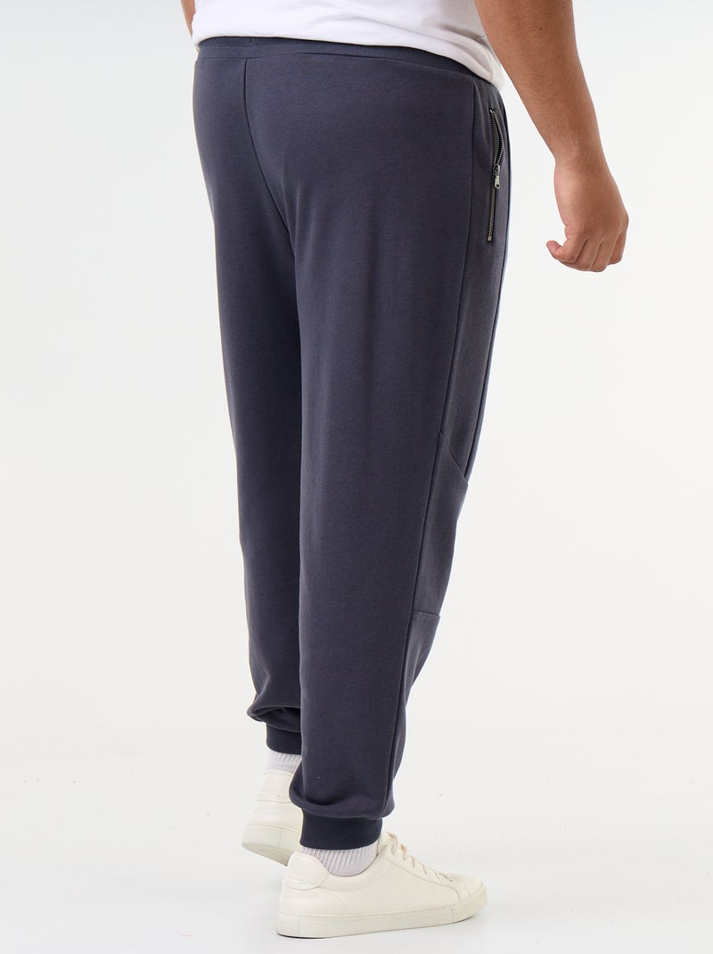 Pantalon de jogging avec bas resserré et poches zippées Bleu - Kiabi